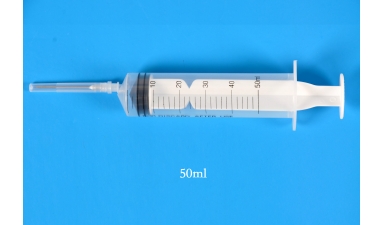 Sterile low frictional force syringes for single use